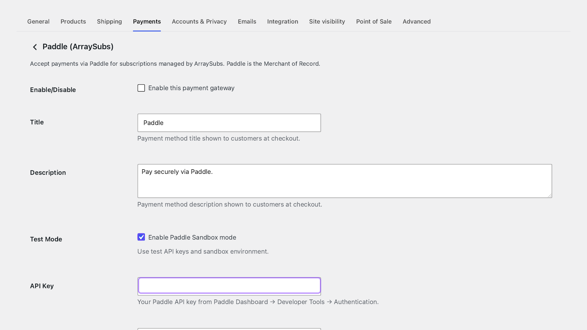 Annotated ArraySubs Paddle sandbox settings screen emphasizing a safe test-mode configuration without exposing credentials.